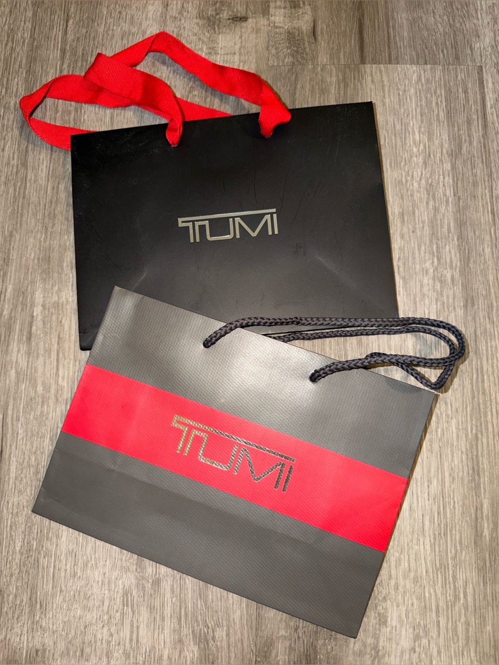 2 Tumi Black and Red shopping bag